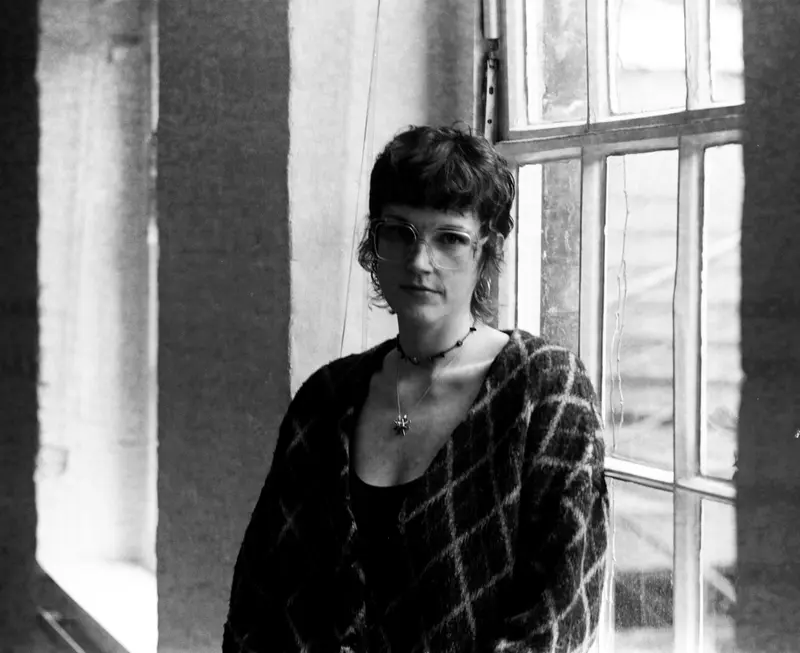 Portrait by the window